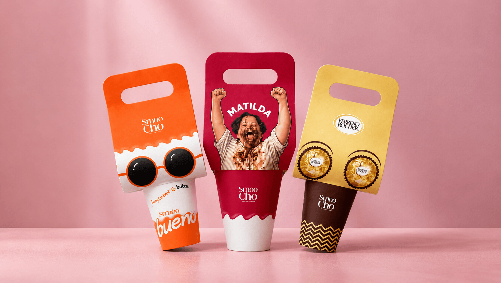 The Bueno, Matilda and Ferrero Rocher cups in their printed SmooCho carry sleeves, standing side by side.